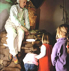 Sasha talks to the children