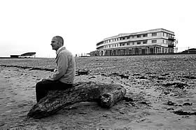 Photograph of Pete on the beach in front of the Midland Hotel Morecambe
